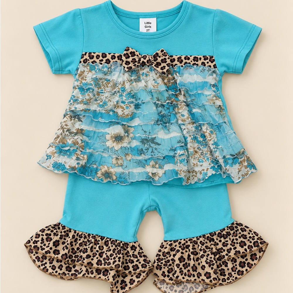 Boutique gently used cheetah teal capri set